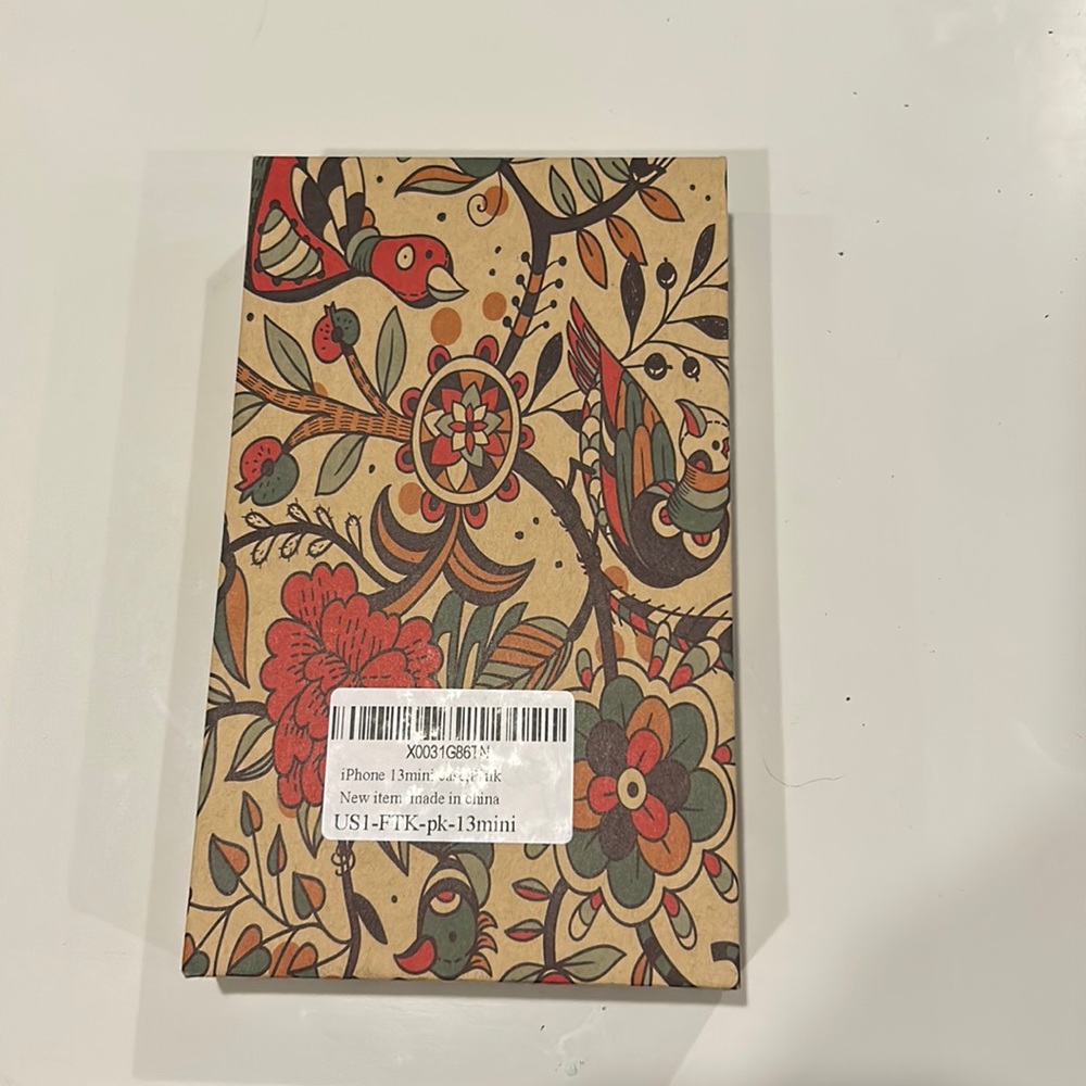 Iphone 13 mini case. Nee in box